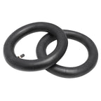 Two black inner tubes on a white background