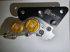 Big brake component with gold and black design on a white background